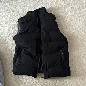 Black puffer vest never worn